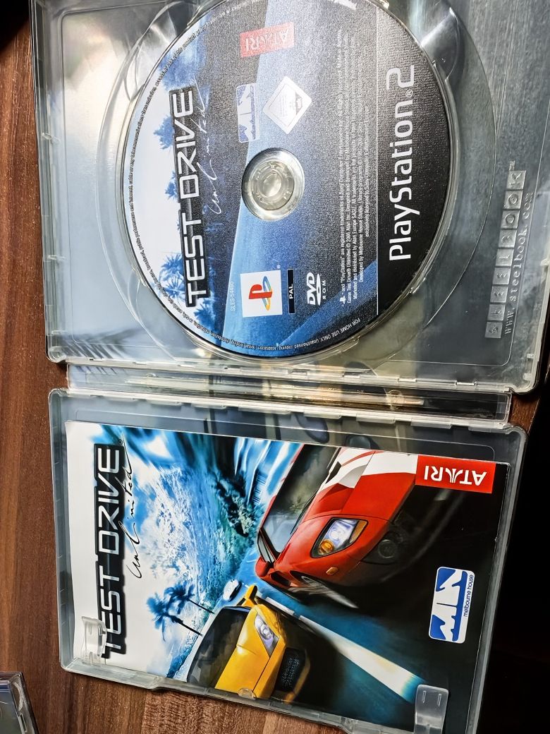 Test Drive Unlimited carcasa metalica Playstation 2