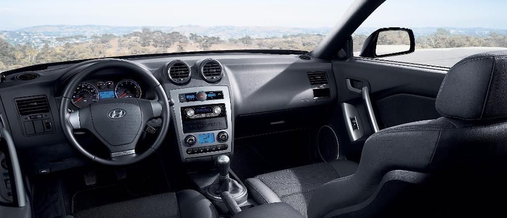 plansa bord hyundai coupe an 2006