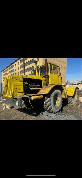 К-700 с восьмикорпусным плугом