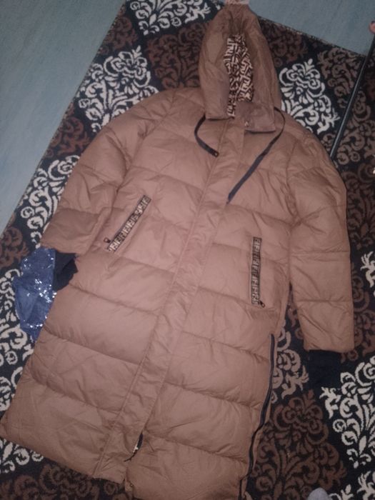 Ayollar kurtkasi sotiladi yangi