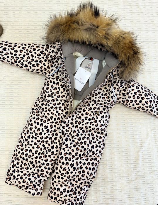 Продам новые зимний комбинезон