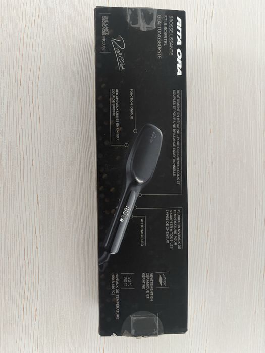 Perie electrica de indreptat parul