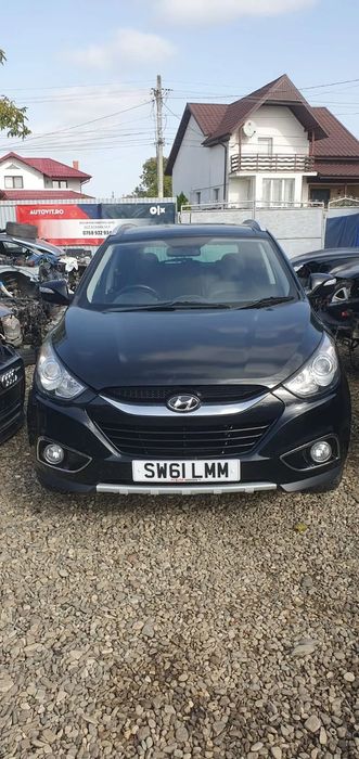 Dezmembrez Hyundai ix35 an 2012 motor 1.7 crdi 136 cp cod motor D4FD rulou polita portbagaj usa usita capac rezervor modul airbag cortina stanga dreapta airbag pasager armatura intaritura bara fata spate suport far amortizoarea capota hayon dezmembrari
