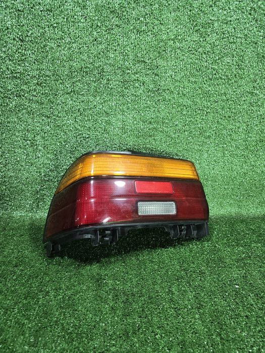 Стоп сигнал фонарь левый Тойота Карина 2 Toyota Carina II новый Оригин