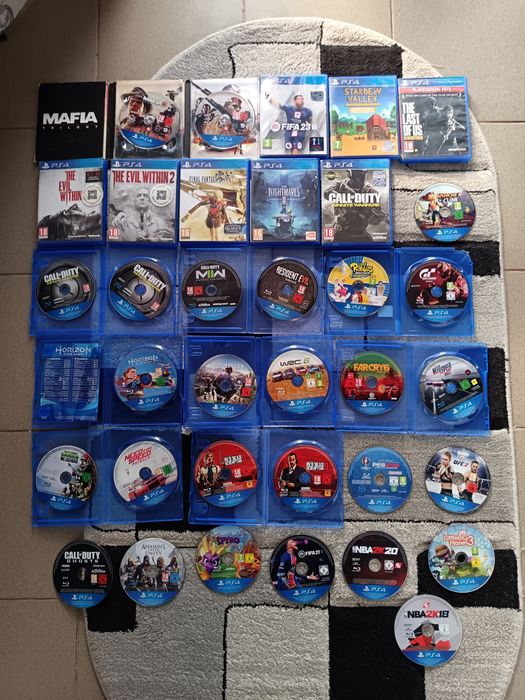 Lot 34 Jocuri PlayStation 4/PS4 The Last of US/RDR 2/NFS/FIFA/UGC