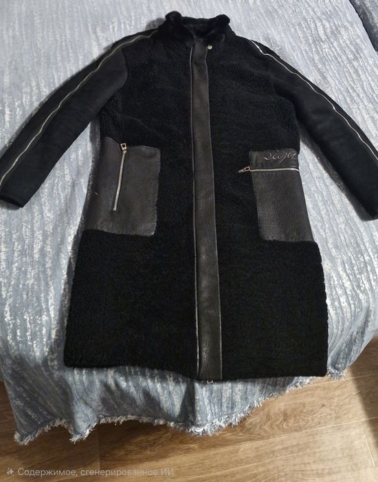 Продам дублёнку чёрного цвета.