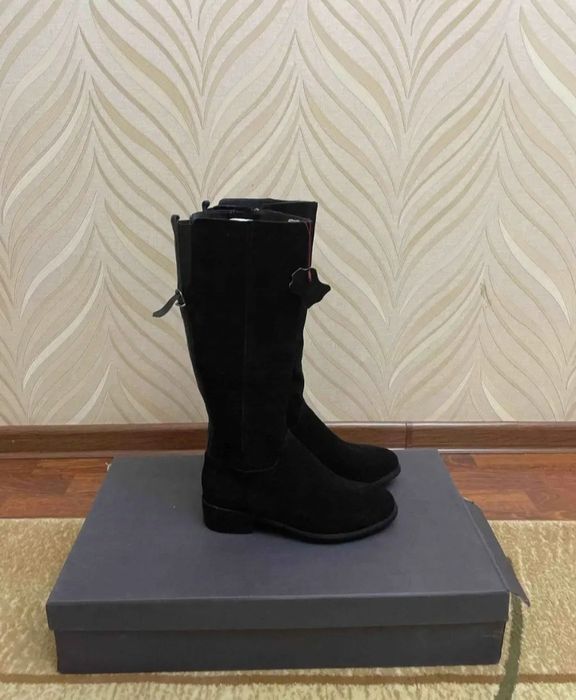 Новые женские сапоги