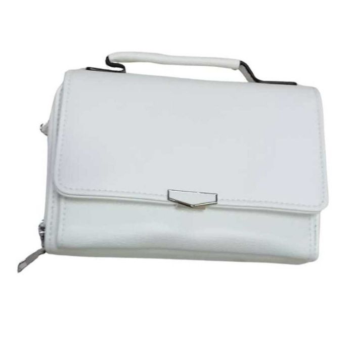 Стилна и компактна к. дамска чанта за през рамо с дълга дръжка.