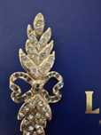 Brosa Yves Saint Laurent 9cm x 3 cm placata cu aur de 18 k