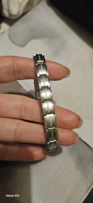 Гривна Nomination.