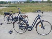Bicicleta electrică Btwin pentru el și ea,  roți de 28