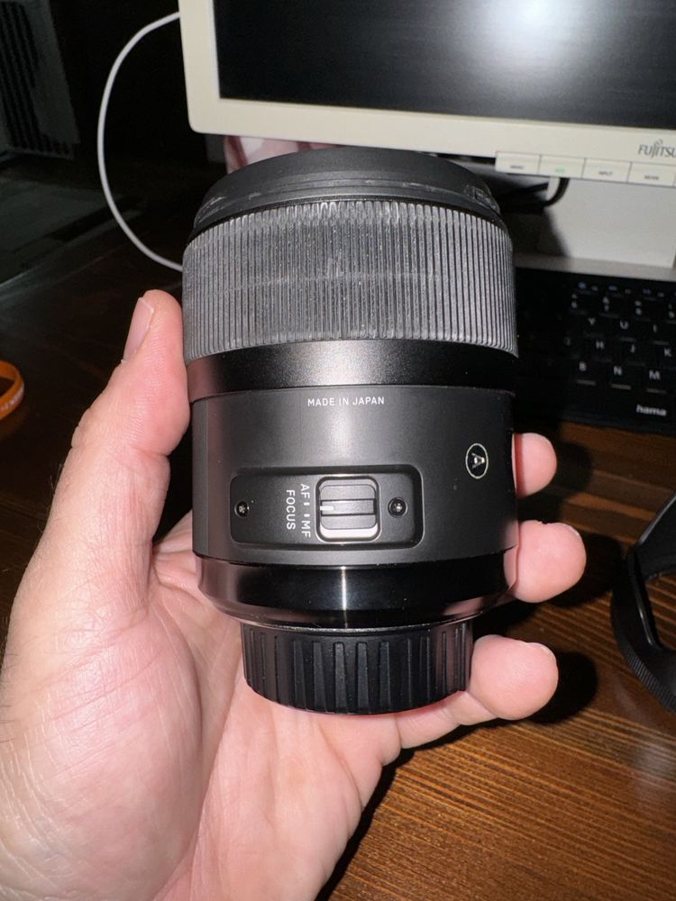 Sigma 35mm f1.4 Nikon cu Usb Dock