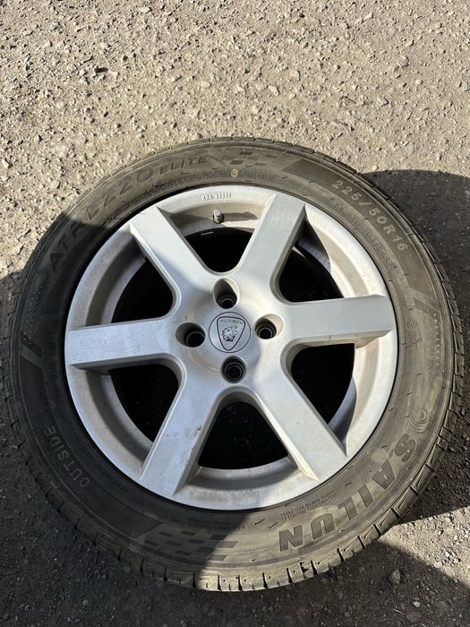 Продам оригинальные немецкие диски 4/100 с резиной