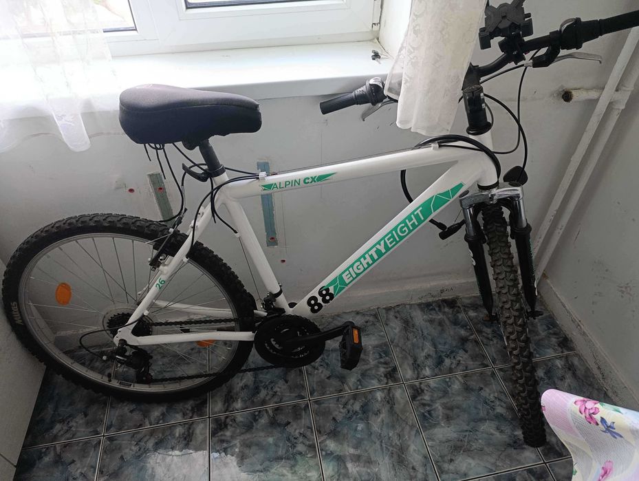 Bicicletă AT8 Alpin CX – Nouă / În stare aproape nouă – Alb cu turcoaz