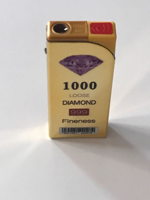 Златиста запалка  против вятър