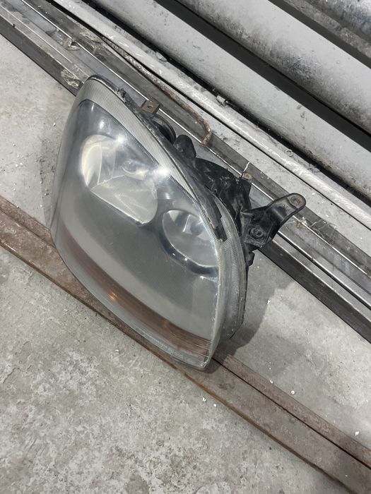 Nissan Almera tino фара перед правый идеальный 70000