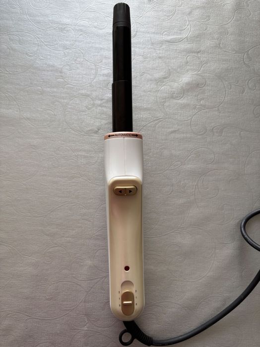 Първокласна самонавиваща Маша за коса ROWENTA CURL ACTIV