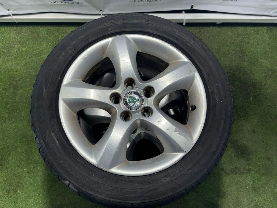 JANTE SKODA R15 / 5x100 / FABIA AMBIENTE II FAB / 195/55 R15 85V / 6JX15 ET43 / 5J0601025A+ CAUCIUCURI (X4)