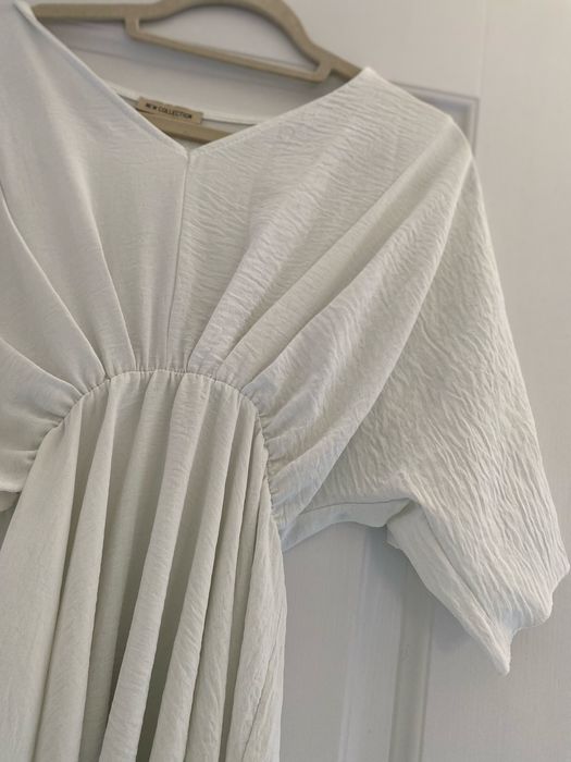 Rochita alba cu maneca scurta ! Perfecta  pentru vara !