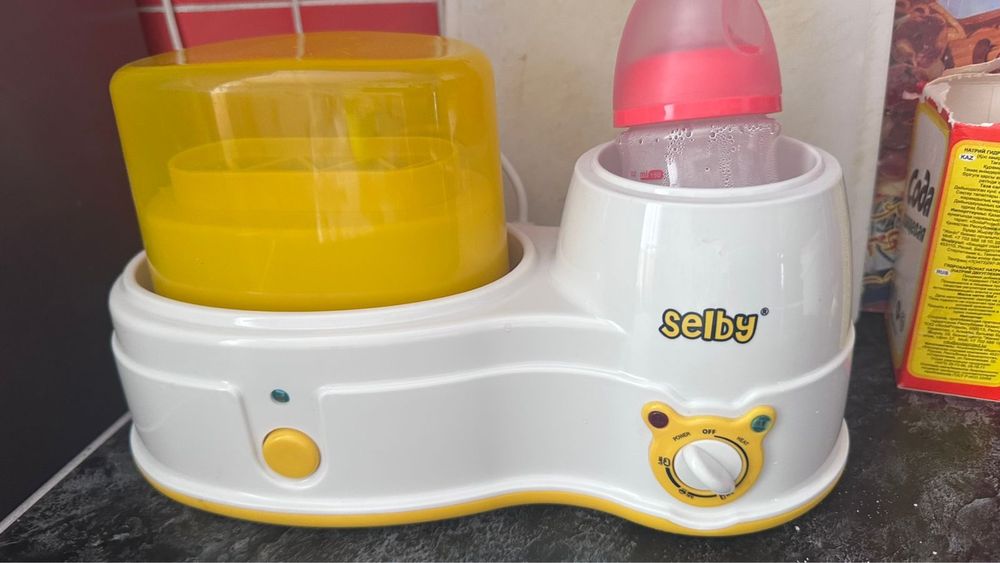 Продам нагреватель бутылок