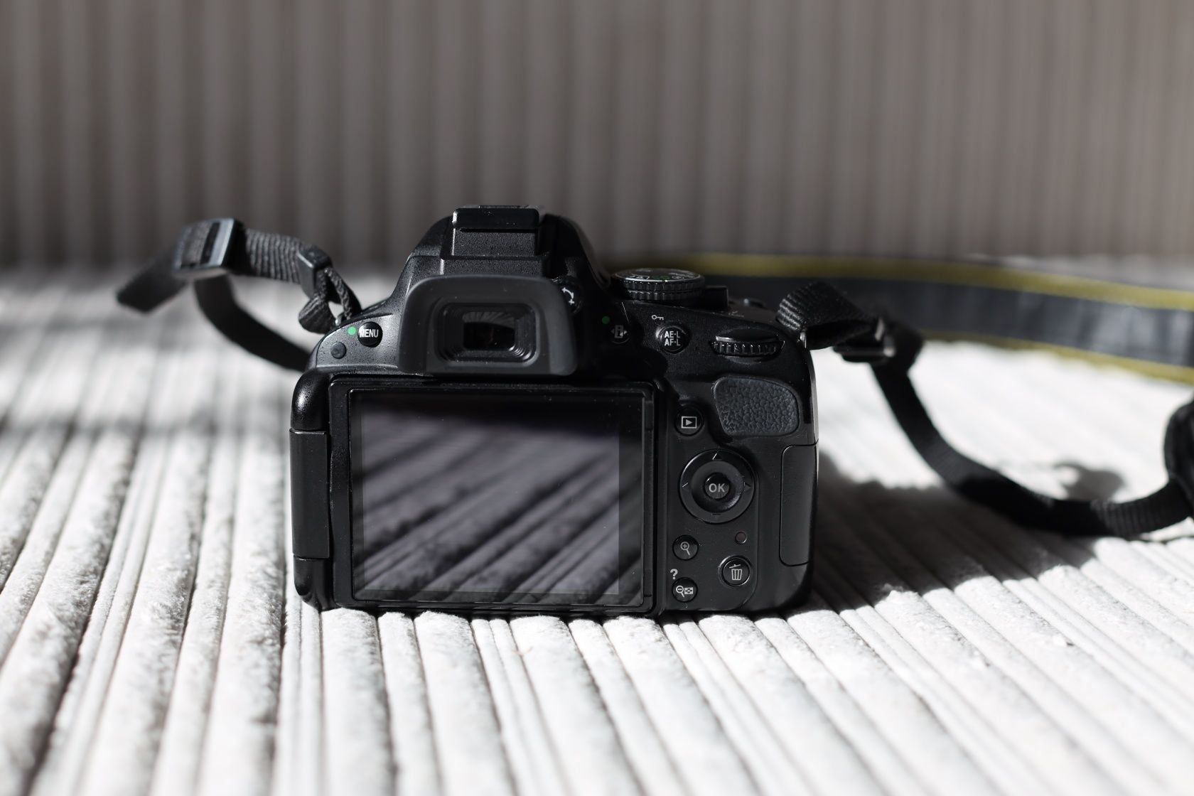 Продам фотоаппарат Nikon d5100 с китовым объективом 18-55