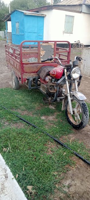 Мото  трех колесный,в хорошем состояний