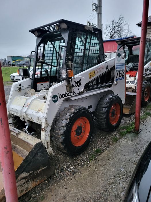 vând Bobcat 763 cu 1400 ore