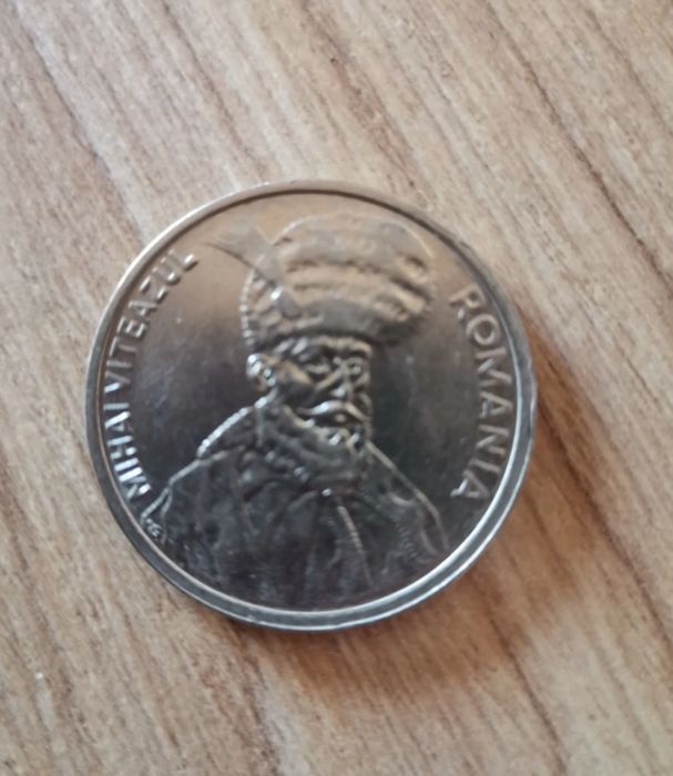 Vand monedă de 100 de lei