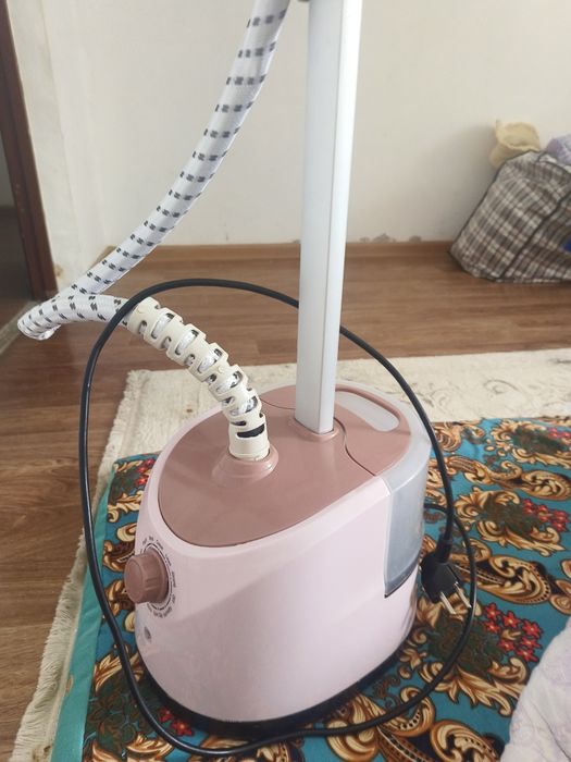 Продам паровой утюг,срочно .