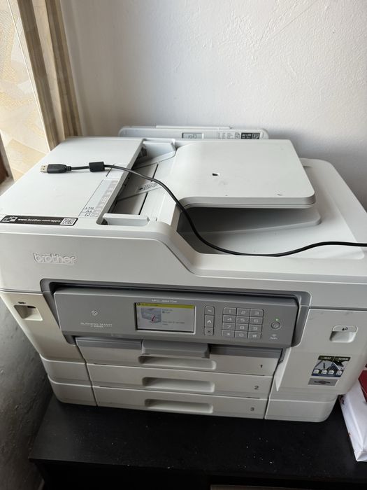 Принтер и скенер Brother