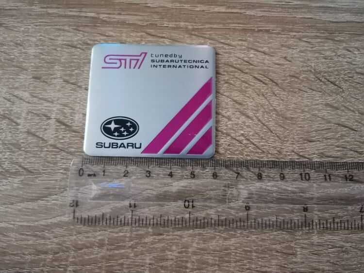 Subaru Tuned By STI емблема