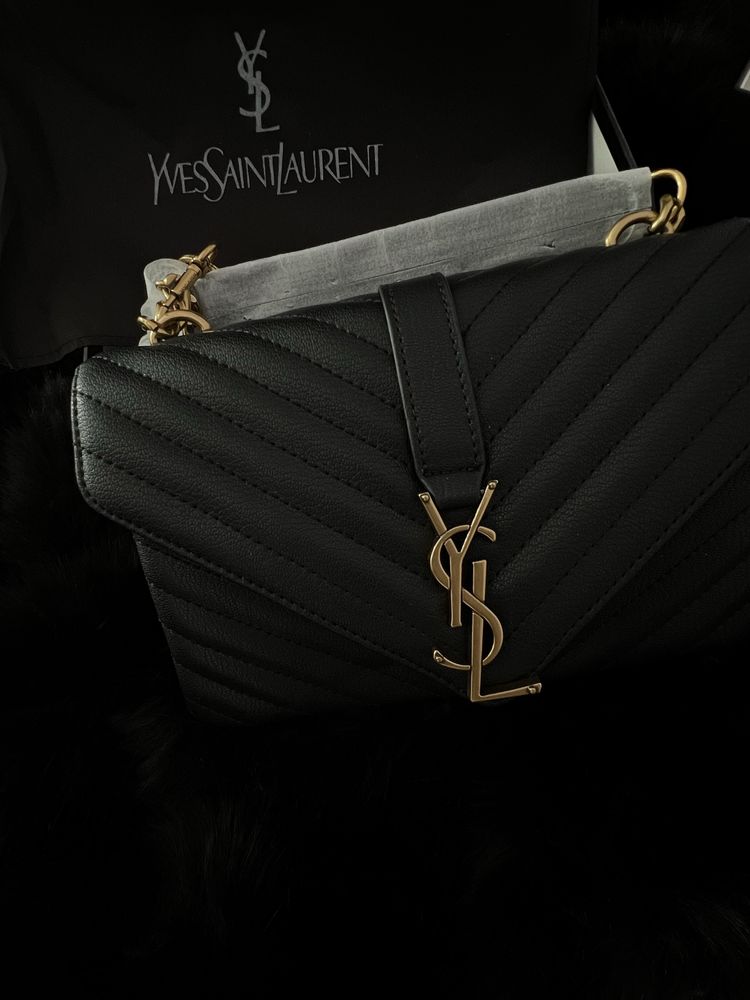 Чанти и портмоне на марката ysl