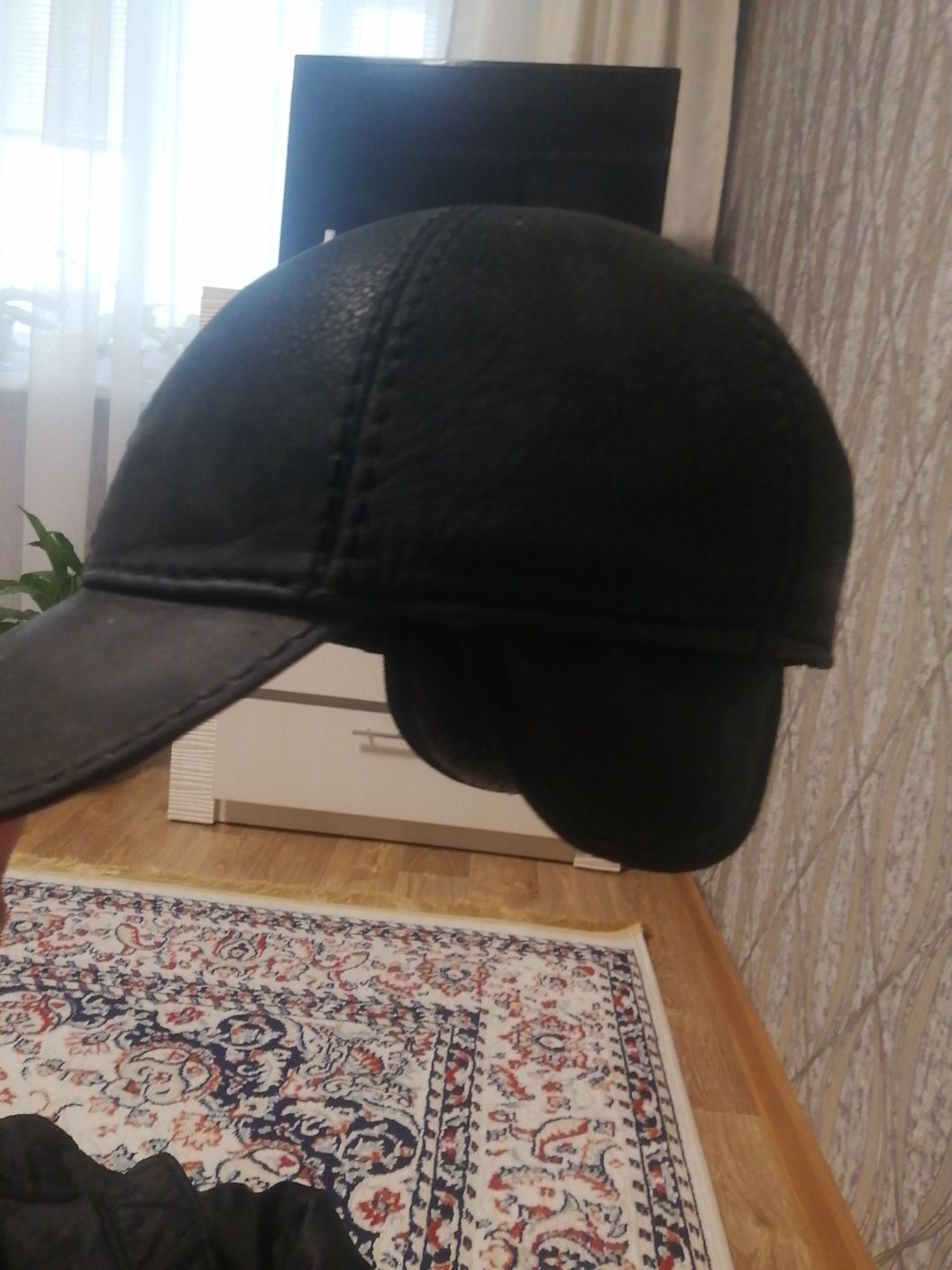 Продам  кепку зимнюю натуральную с ушками