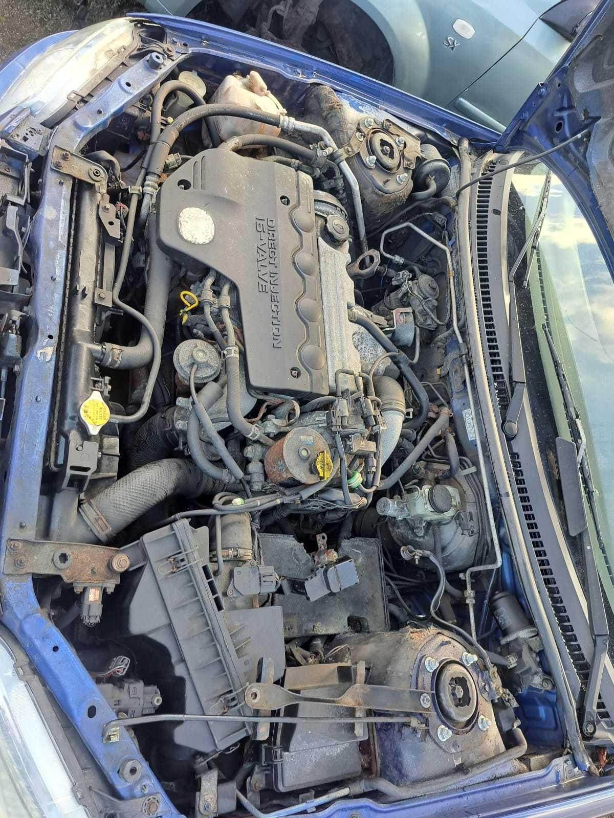 Dezmembrez Mazda 323 ,2.0 diesel an fabricație 2002