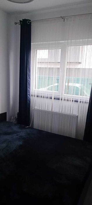 Inchiriez ap 2 camere mobilat/utilat complet,curte proprie-Sanpetru