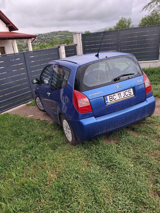 Vand / dau la schimb  pe porci masina citroen c2 benzina motor 1.4  ,