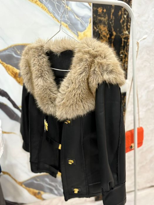 Продам пуховик новый