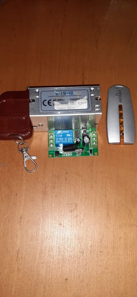 Mecanism pentru acționare electrică ușă garaj