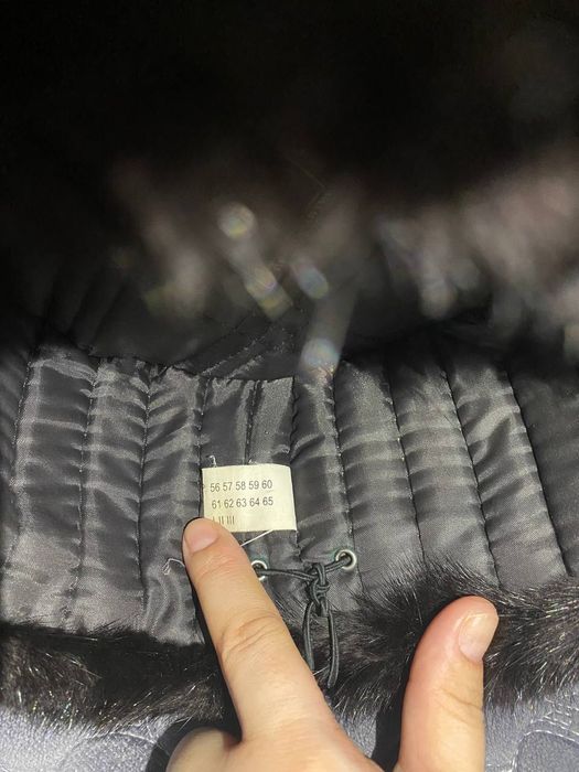 Продам норкавую шапку ушанку алмазно чёрного цвета в отличном состояни