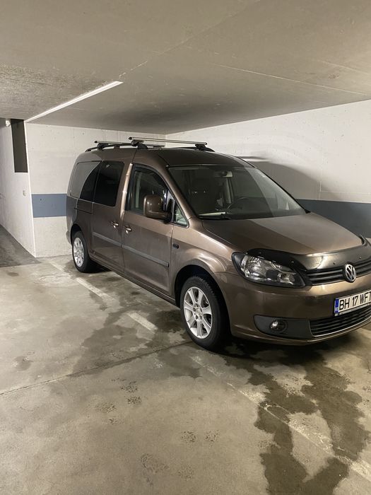 Vand wv caddy 2011 7 locuri model cel mai lung