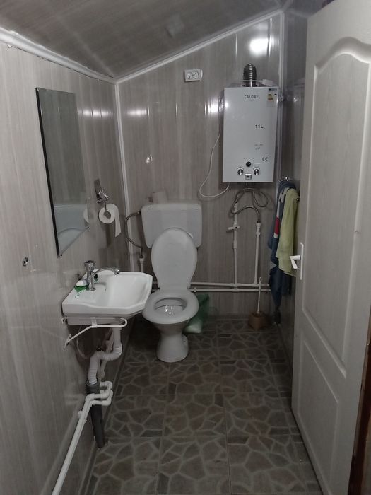 Vind loc de casa,1200mp cu construcție tip casa de vacanta