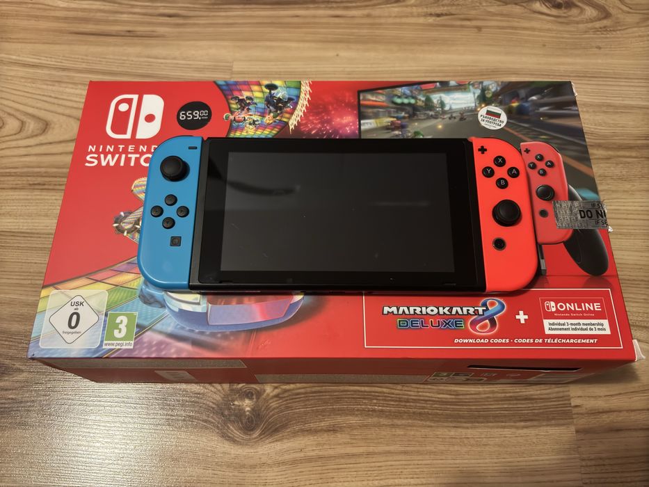 Nintendo Switch + Legend Of Zelda: BOTW