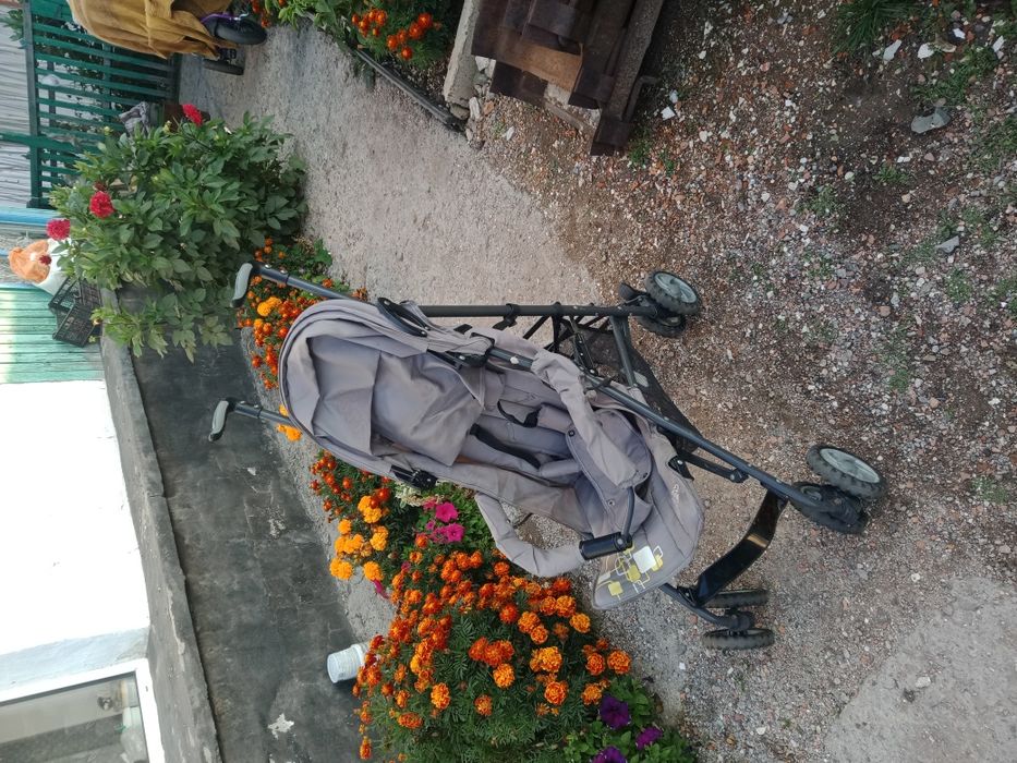 Детская коляска -трость