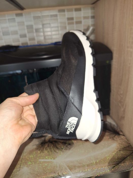 Ghete the north face  purtati foarte putin ,in stare foarte buna