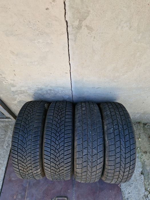 215 65 16  iarna M+S  Goodyear/Powertrac