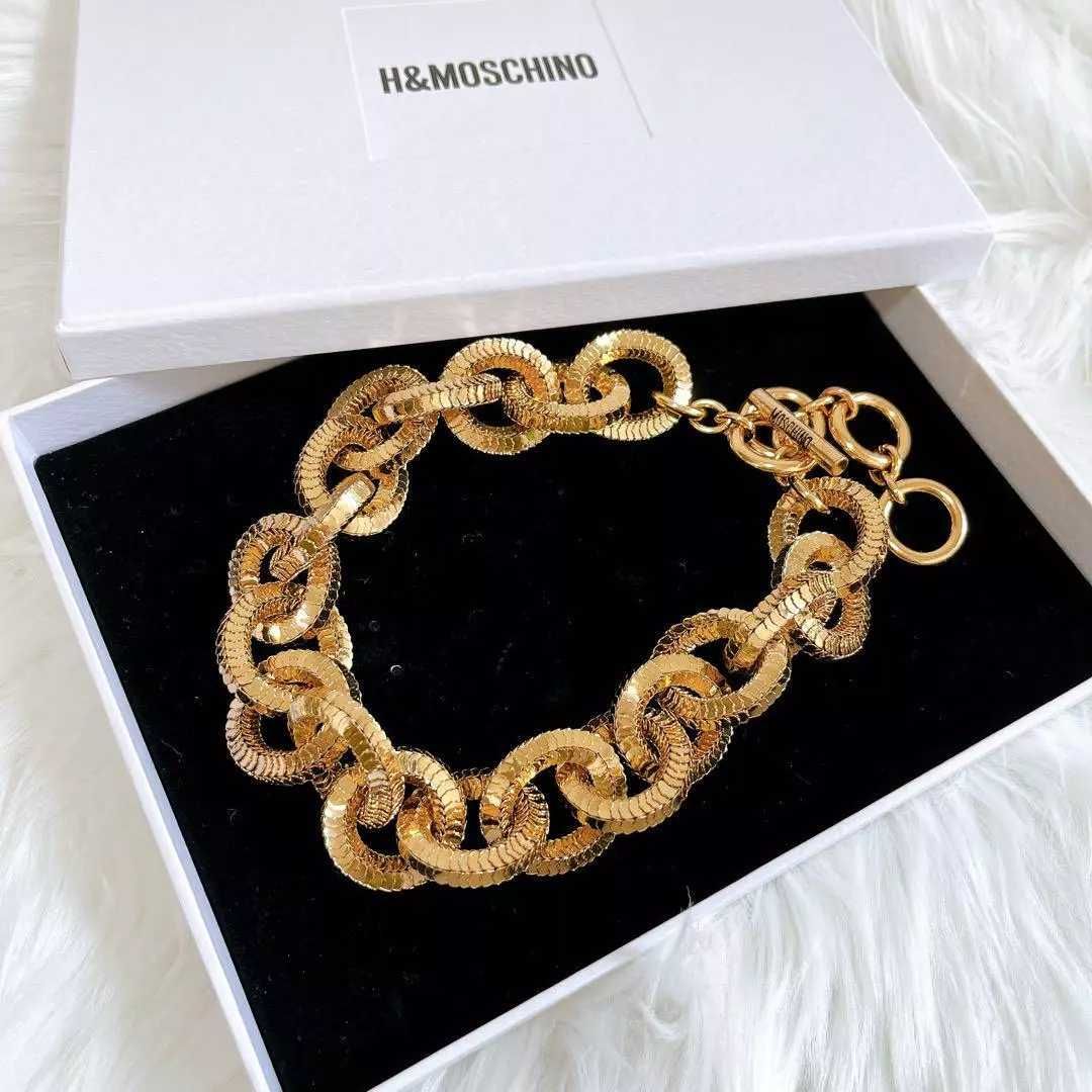 Чисто нови! Златисто колие и   гривна на H&M Moschino