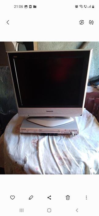 Tv panasonic cu dvd tip statie și boxe