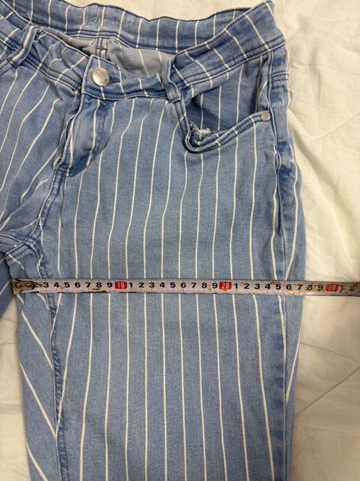 Blugi elastici de dama cu dungi