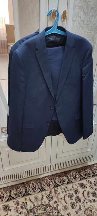 Мужские костюмы и пиджаки