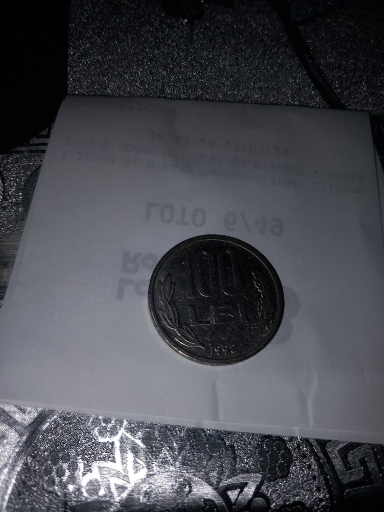 Vind moneda metalica de 100 lei